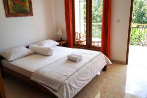 Gallery image of Uluwatu Made Guesthouse in Uluwatu
