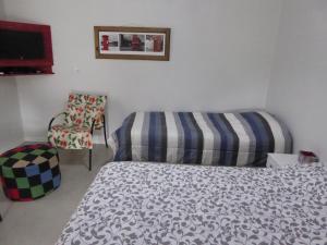 Postel nebo postele na pokoji v ubytování Villa Holística