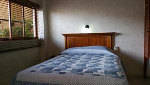 Postel nebo postele na pokoji v ubytování Hotel Rex
