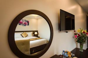 TV a/nebo společenská místnost v ubytování Sapa Wings Hotel