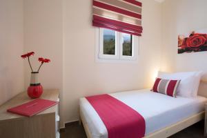 Postel nebo postele na pokoji v ubytování Alegria Boutique Villas
