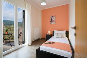Postel nebo postele na pokoji v ubytování Alegria Boutique Villas