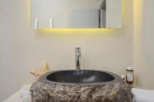 Kúpeľňa v ubytovaní Aphrodite Luxury Apartments