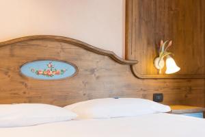 Posteľ alebo postele v izbe v ubytovaní Hotel Pontiglia