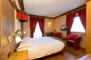 Posteľ alebo postele v izbe v ubytovaní Hotel Pontiglia