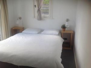 Postel nebo postele na pokoji v ubytování Bed & Breakfast Zeeland