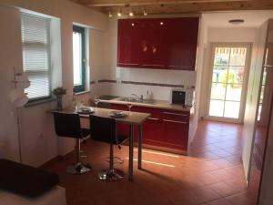 Kuchyň nebo kuchyňský kout v ubytování Apartment Leonarda