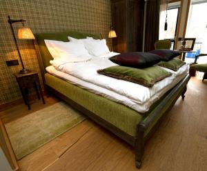 Voodi või voodid majutusasutuse Eriksberg Hotel & Nature Reserve toas