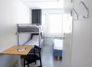 Postel nebo postele na pokoji v ubytování STF Vandrarhem Oscar