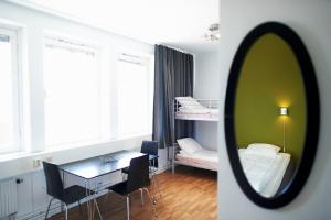 Postel nebo postele na pokoji v ubytování STF Vandrarhem Oscar