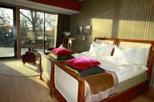 Voodi või voodid majutusasutuse Eriksberg Hotel & Nature Reserve toas