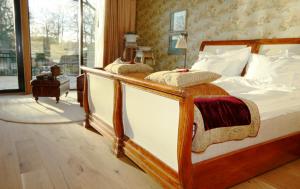 Voodi või voodid majutusasutuse Eriksberg Hotel & Nature Reserve toas