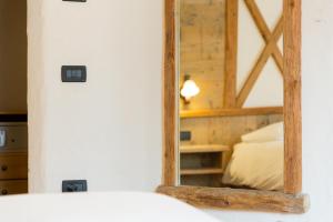 Posteľ alebo postele v izbe v ubytovaní Hotel Pontiglia