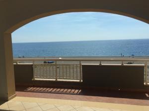 a view of the beach from a balcony at Casa Vacanze Samira in Fondachello