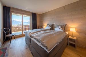 Voodi või voodid majutusasutuse Apartment La Forêt 5 - Spa access - Centre Station toas