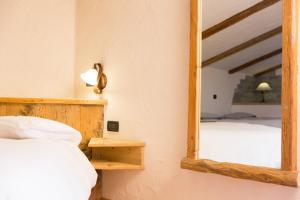 Posteľ alebo postele v izbe v ubytovaní Hotel Pontiglia