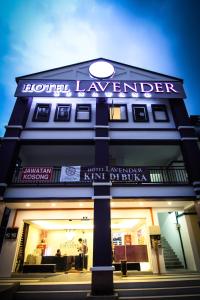 a building with a hotel lobby with a sign on it at Hotel Lavender Senawang in Seremban