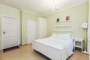 
Кровать или кровати в номере Апартаменты Мошков 
