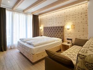 Katil atau katil-katil dalam bilik di Hotel Garni My Ledro