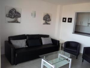 Posedenie v ubytovaní Precioso Apartamento Frente Al Mar