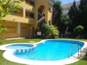 Bazén v ubytovaní Precioso Apartamento Frente Al Mar alebo v jeho blízkosti