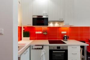 Kuchyňa alebo kuchynka v ubytovaní F4 Fiumei Apartment