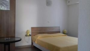 Posteľ alebo postele v izbe v ubytovaní Studio Rocco