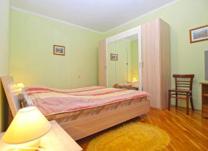 Postel nebo postele na pokoji v ubytování Apartments Robert 1317