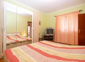 Postel nebo postele na pokoji v ubytování Apartments Robert 1317