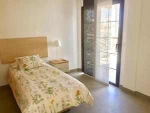 Postel nebo postele na pokoji v ubytování Villas Las Maretas