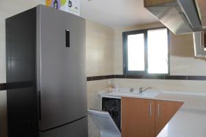 Kuchnia lub aneks kuchenny w obiekcie Appartement tout confort, Rez-de chaussée,3 chambres, 2 salles de bain