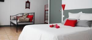 Кровать или кровати в номере Hotel du Porge
