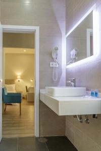 Koupelna v ubytování Porto Domus Hotel
