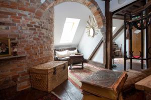 a living room with a brick wall at Baderhaus in Bruck an der Mur