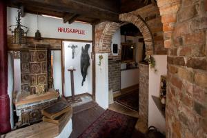 an entrance to a room with a fireplace in a building at Baderhaus in Bruck an der Mur