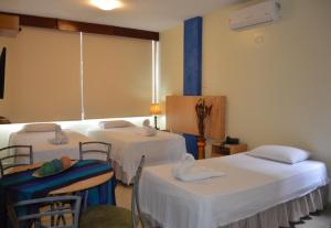 Giường trong phòng chung tại San Francisco Apart Hotel