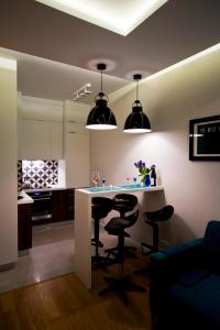 Posedenie v ubytovaní Apartament Wśród Drzew