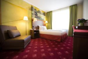Postel nebo postele na pokoji v ubytování Hotel König Ludwig II