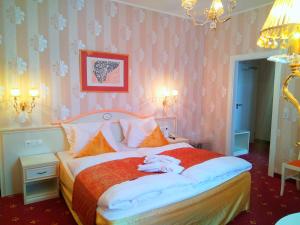 Voodi või voodid majutusasutuse Alexa Hotel toas