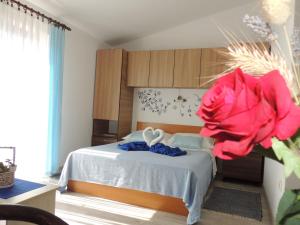 Postel nebo postele na pokoji v ubytování Apartments Barcarola