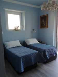 Postel nebo postele na pokoji v ubytování Casa Garibaldi