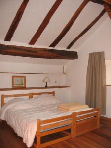 Un pat sau paturi într-o cameră la Gite du Repos