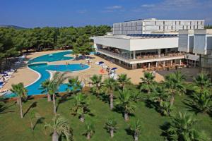 an aerial view of a resort with a swimming pool at Apartmani Pilić Ljiljana in Brodarica
