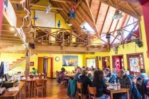 A restaurant or other place to eat at Rancho Grande Hostel