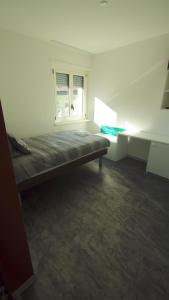 Voodi või voodid majutusasutuse Albergo Porta Verzasca toas