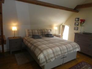 Кровать или кровати в номере Guillemont Halt
