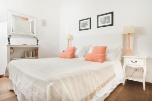 
Ein Bett oder Betten in einem Zimmer der Unterkunft Casa Di Capri
