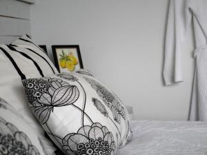Letto o letti in una camera di Onkel Enkels Pensionat