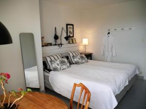 Letto o letti in una camera di Onkel Enkels Pensionat