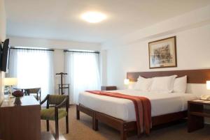 Cama ou camas em um quarto em Tierra Viva Arequipa Plaza